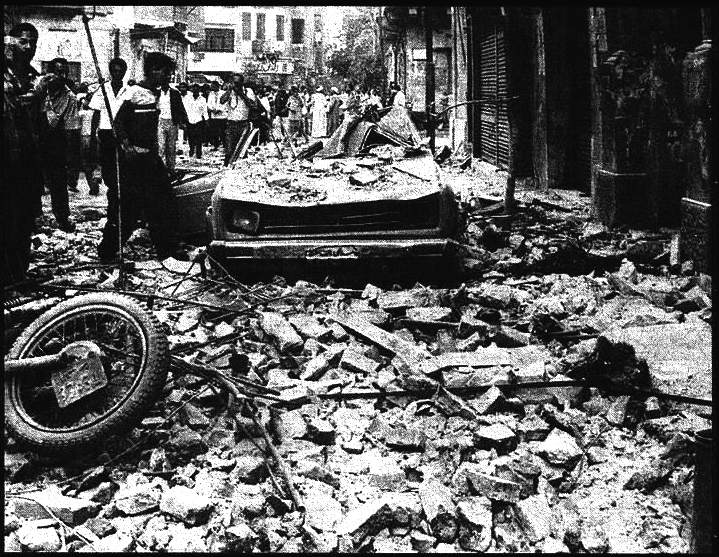 Rubble from falling parapets litters a Cairo street in the aftermath of the 1992 Dahshur (Egypt) Earthquake