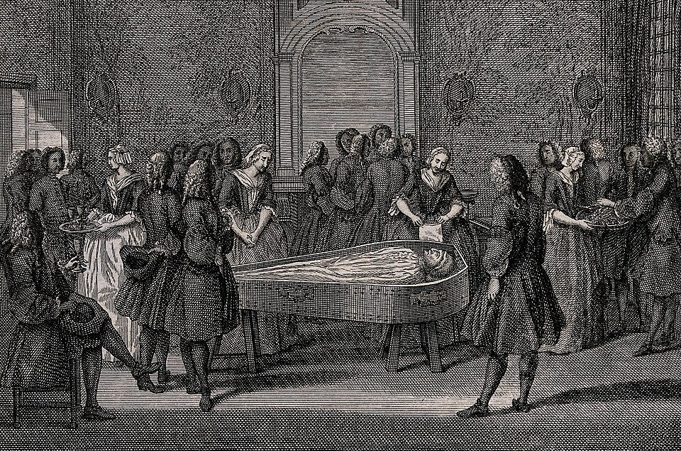 A corpse is dressed in grave clothes and layed out for mourners to visit. Etching with engraving. Iconographic Collections
