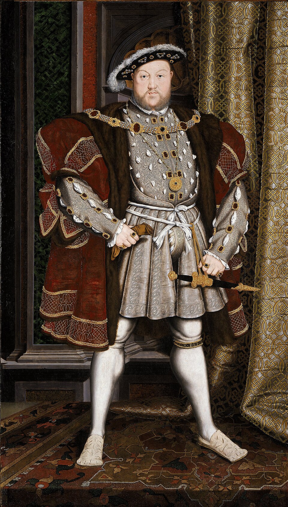 Cropped version of the full portrait, showing the "jags" (i.e., cuts) in the body and sleeves of the doublet, through which "puffs" of the shirt have been…