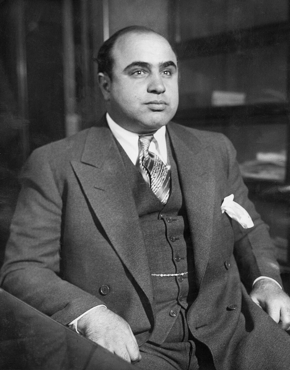 "Scarface" Al Capone is shown here at the Chicago Detective bureau following his arrest on a vagrancy charge as Public Enemy No. 1 in this 8 x 10 black &…