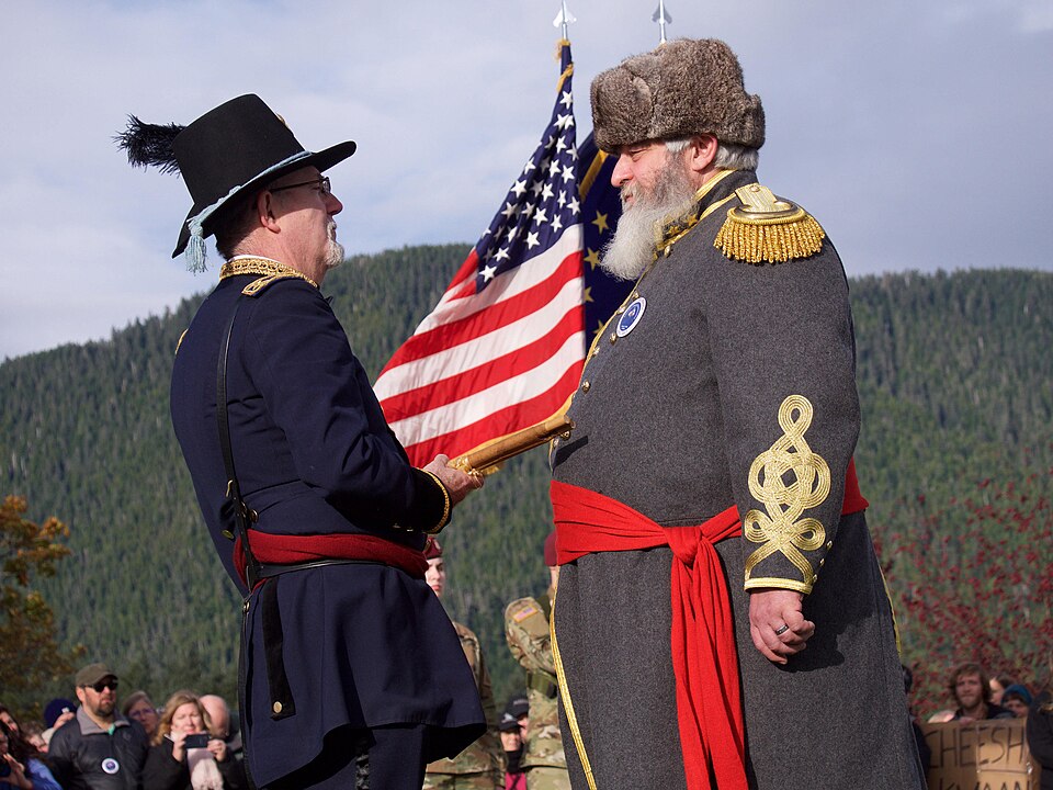 Jay Sweeney (left), portraying Army Maj. Gen. Lovell Rousseau, and Ron Conklin, portraying Russian Commissioner Alexi Peschouroff, reenact the transfer of…