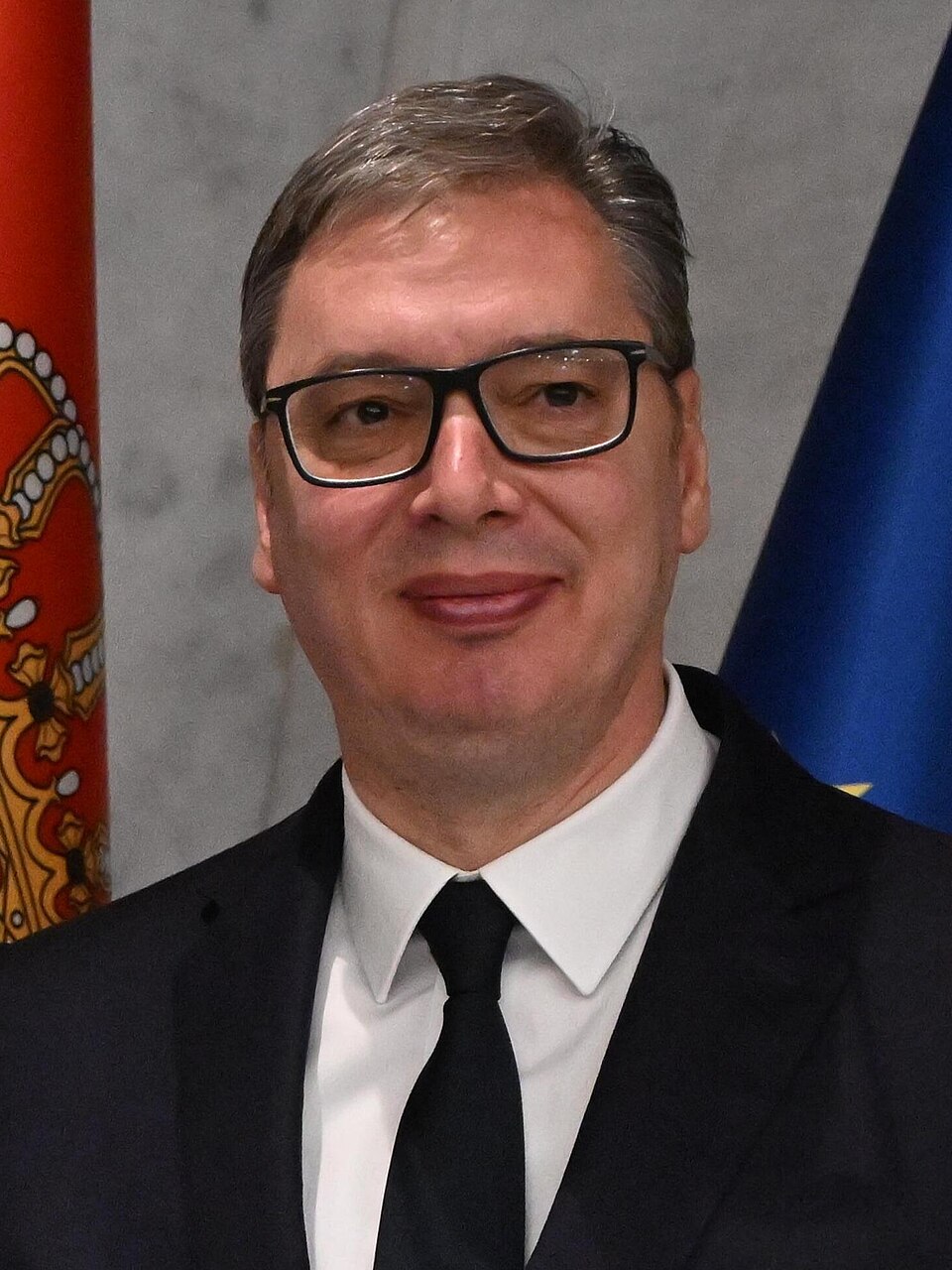 Handshake between Aleksandar Vučić, President of the Republic of Serbia, on the right and Marta Kos.