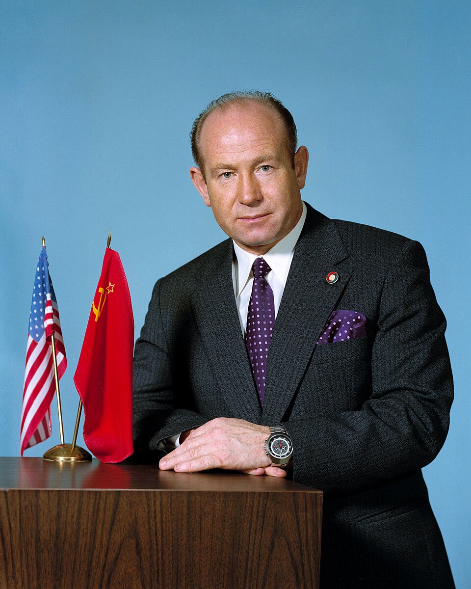Alexei Leonov in April 1974. Leonov is wearing a pin with a version of the emblem for the Apollo–Soyuz Test Project , then in development. The emblem can be…