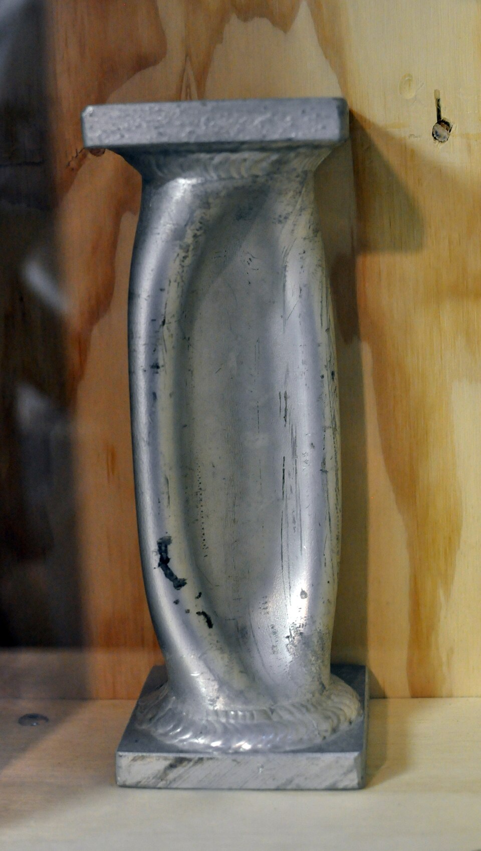 An aluminium cylinder (5mm thickness) after 700 bar pressure.
