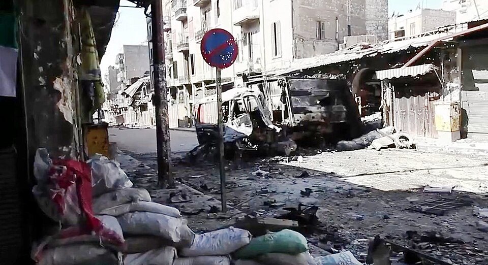 Bombed out vehicles Aleppo during the Syrian civil war.