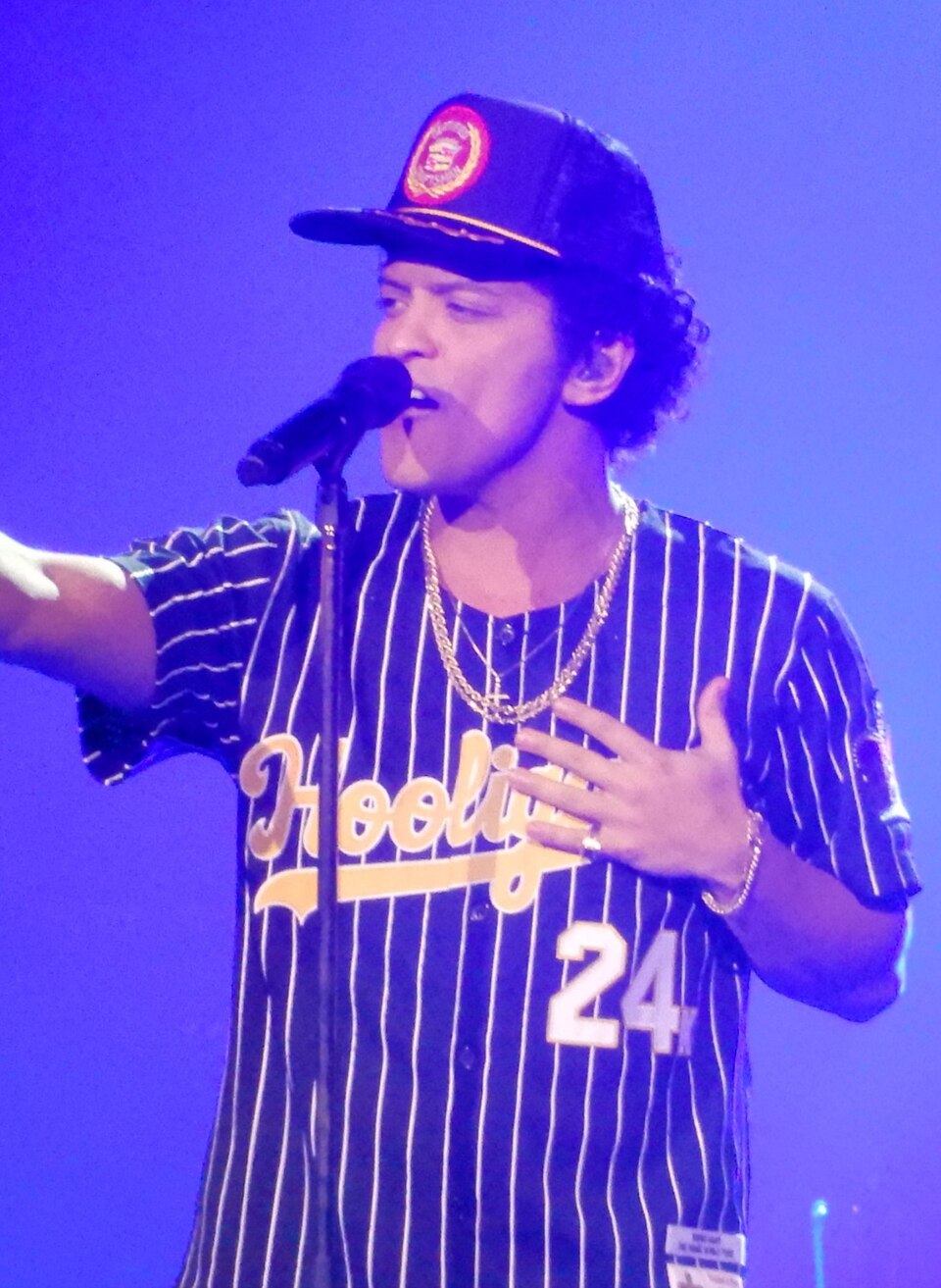 This is a photo of American entertainer Bruno Mars performing live during his 24K Magic World Tour