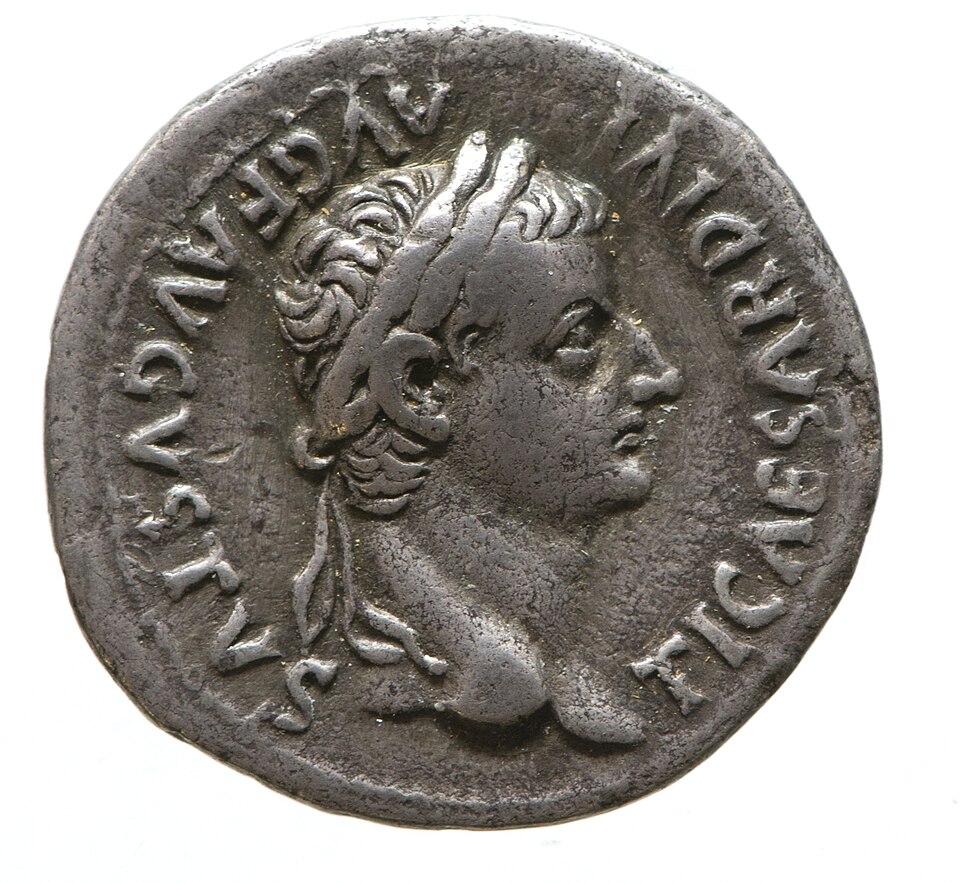 Obverse (front) of a denarius of w:Tiberius head facing right laureate