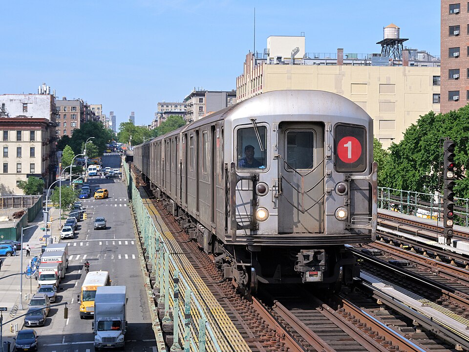 A downtown 1 train approaches 125th Street station.