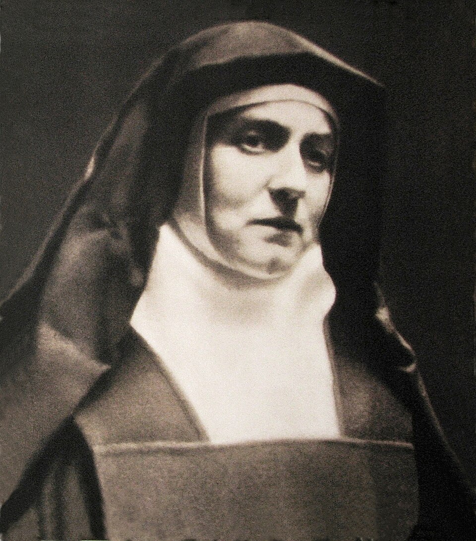 The so-called "passport" photo taken in the doorway of the Cologne Carmel. A passport picture that Edith Stein (1891–1942) had to have taken for her…
