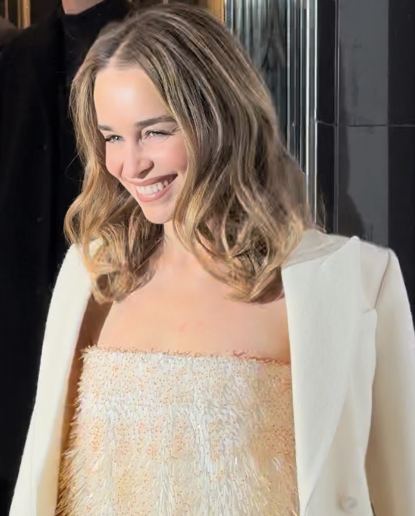 Emilia Clarke in a white dress at the Harper's Bazaar Women of the Year Awards, November 2023.