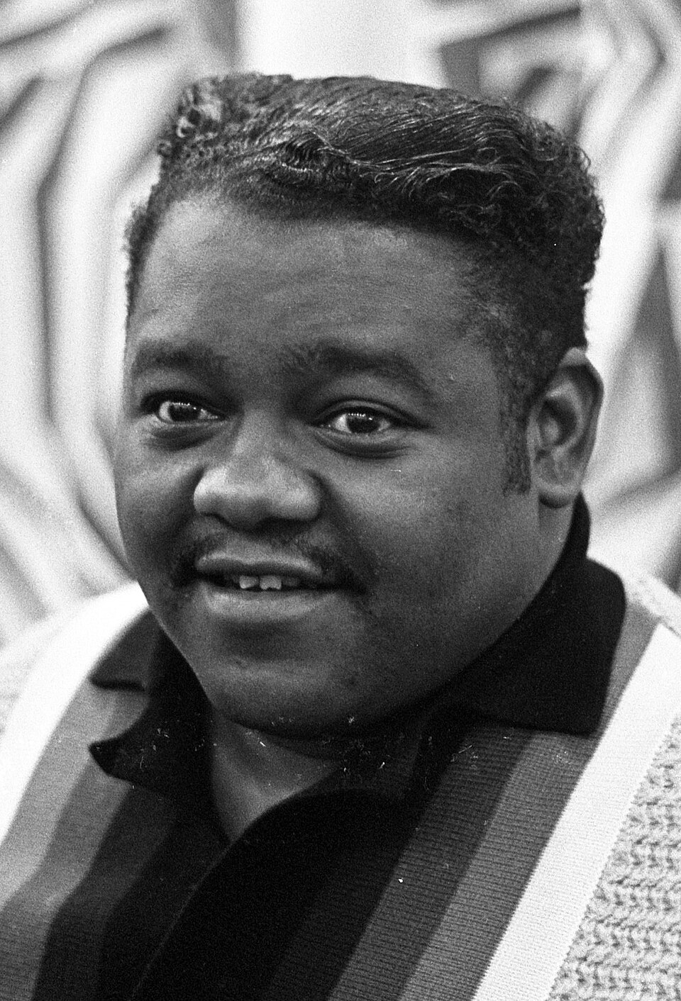 Fats Domino in Amsterdam in 1962. This is cropped from the source, converted to B&W, and the brightness & contrast were changed a little