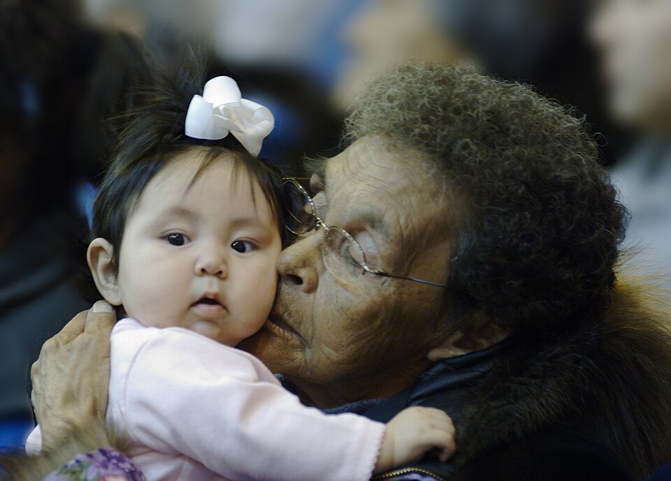 Example of a kunik from an Iñupiat woman to a small child. This picture was taken during a Nalukataq dance at Barrow Alaska