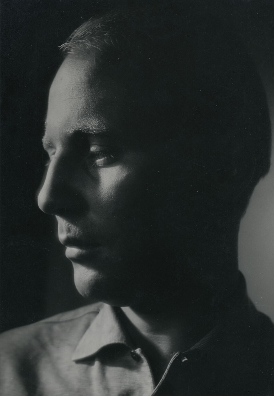 Black and white portrait photograph of conductor Hans Werner Henze, inscribed to Tino Barindelli, 1962.