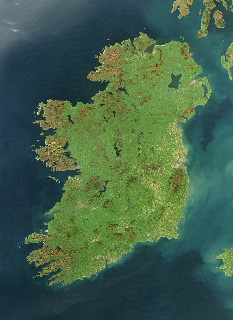It is easy to see from this true-colour image why Ireland is called the Emerald Isle. Intense green vegetation, primarily grassland, covers most of the…
