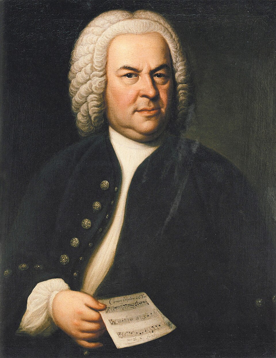 Johann Sebastian Bach (aged 61) in a portrait by Elias Gottlob Haussmann , second version of his 1746 canvas. Bach is holding a copy of the six-part canon…