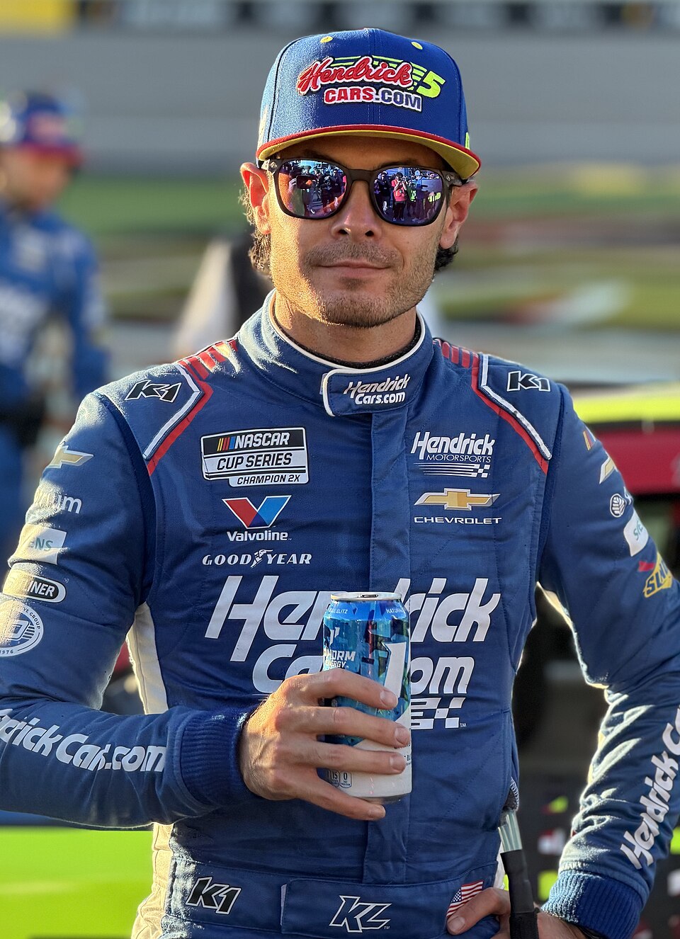 A portrait photo of racing driver Kyle Larson in 2026.