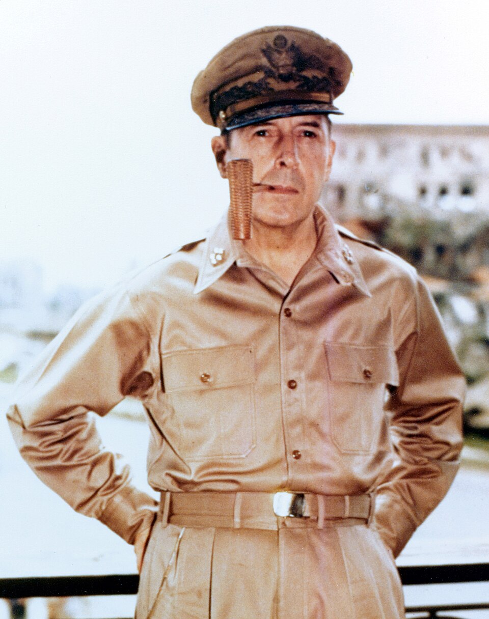General of the Army Douglas MacArthur smoking his corncob pipe, probably at Manila, Philippine Islands, 2 August 1945.