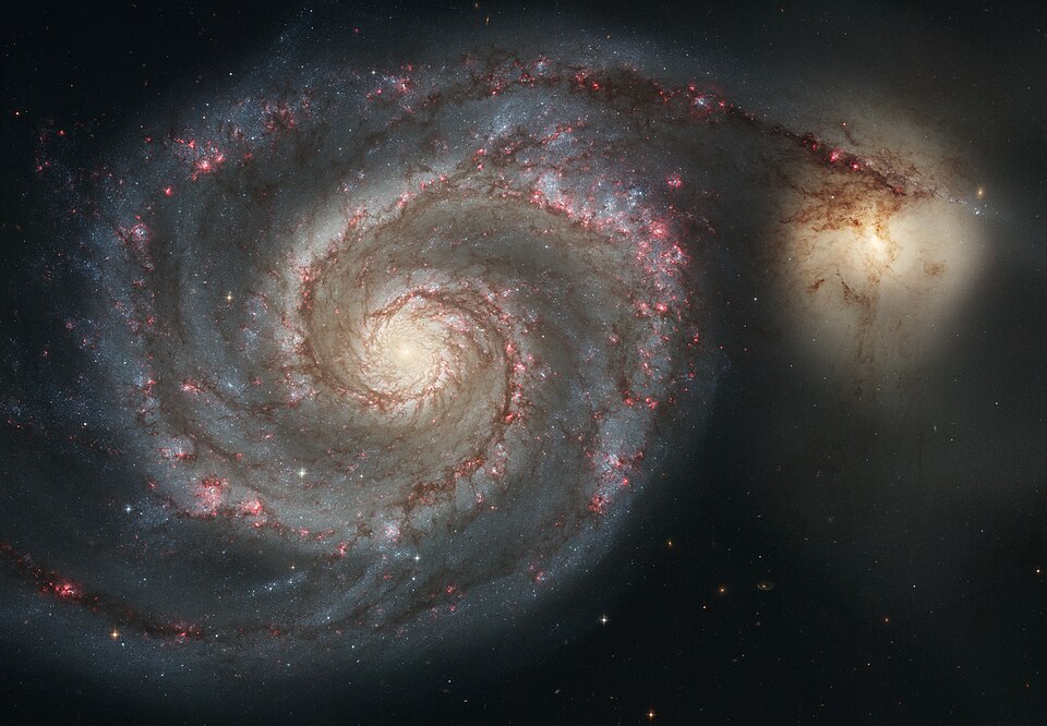 The Whirlpool Galaxy (Spiral Galaxy M51, NGC 5194), a classic spiral galaxy located in the Canes Venatici constellation, and its companion NGC 5195 .