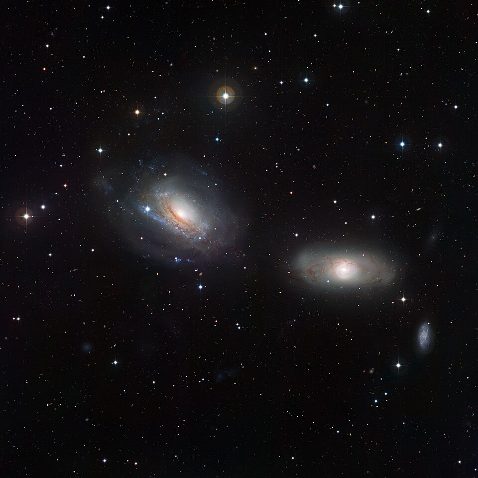This image from the Wide Field Imager on the MPG/ESO 2.2-metre telescope at the La Silla Observatory in Chile captures the pair of galaxies NGC 3169 (left)…