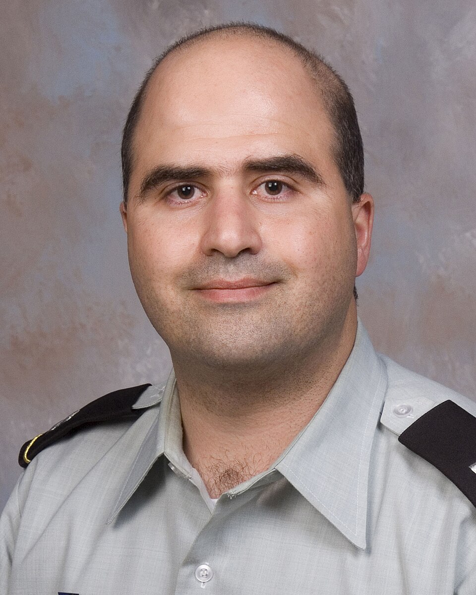 Nidal Hasan photographed in 2007 at the Uniformed Services University of the Health Sciences. Hasan was a United States Army captain at the time of the photo.
