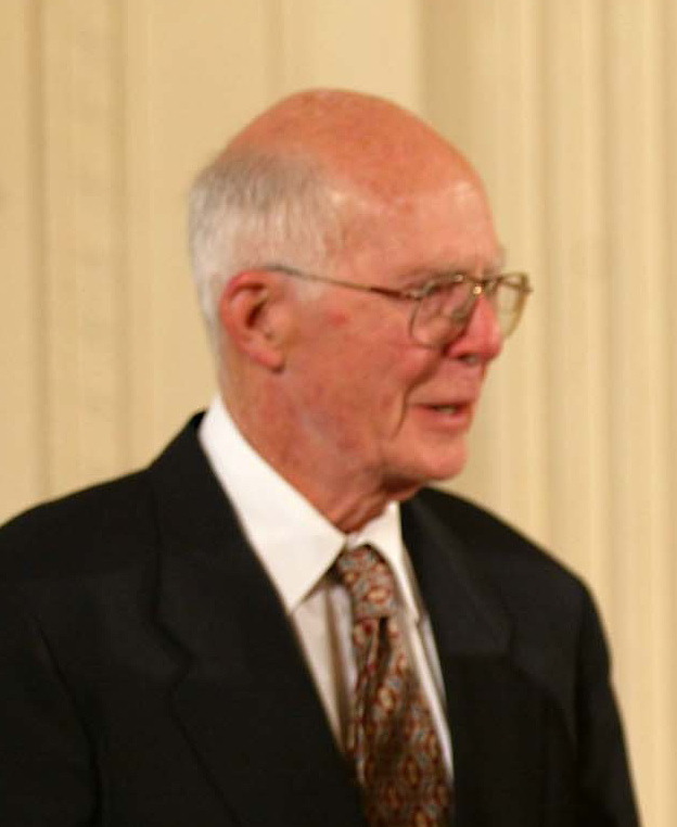 Raymond Davis, Jr. receives the Medal of Science from President Bush, with OSTP Director Marburger looking on.