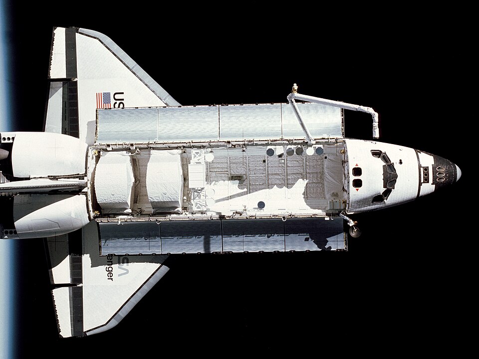 S83-35803 (22 June 1983) --- The Earth-orbiting space shuttle Challenger against the blackness of space was captured by a 70mm camera onboard the…
