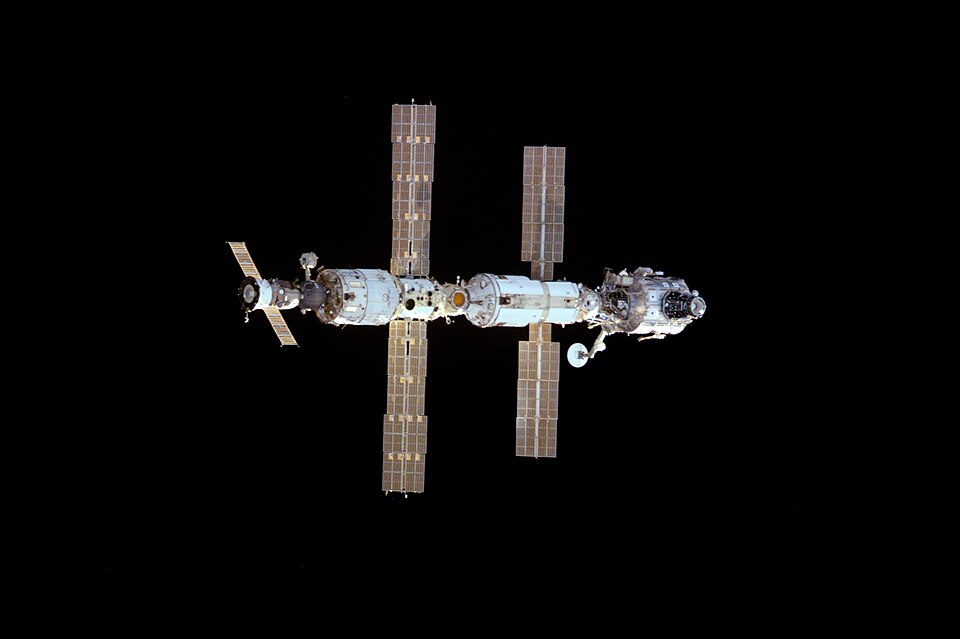 International Space Station (ISS), against darkness of space, photographed by STS-97 crew members onboard the approaching Space Shuttle Endeavour.