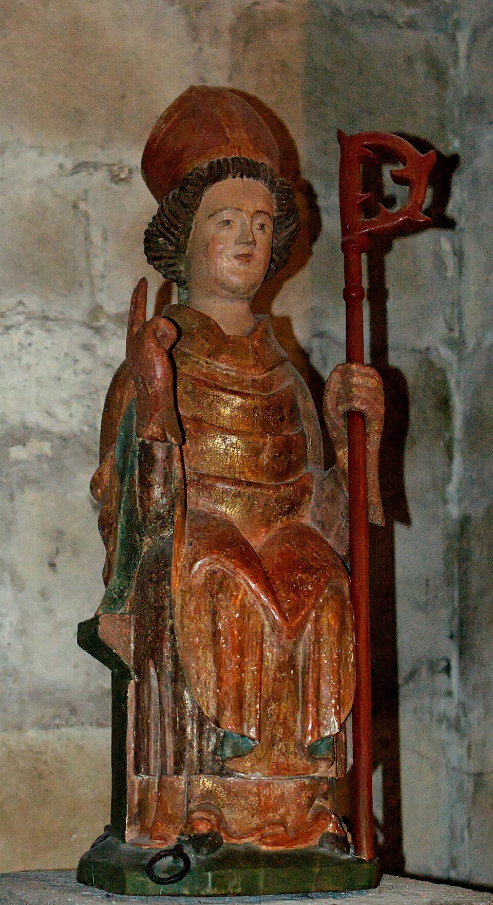 Statue of St. Austremonius, apostle and bishop of Auvergne. Wood, 15th/16th century, H. 90 cm (35 ¼ in.). Crypt of the church Saint-Austremonius of Issoire,…