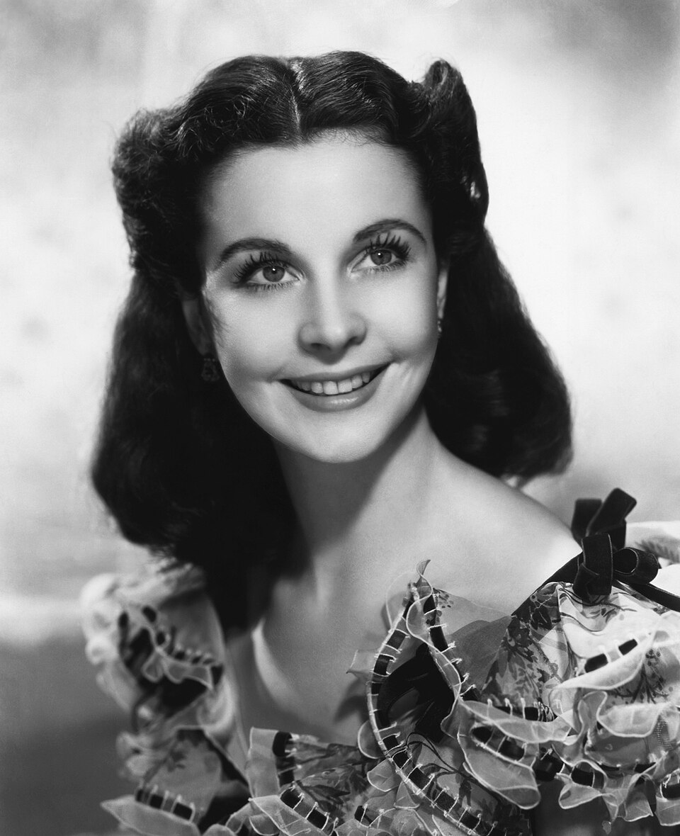 Photo of actress Vivien Leigh as Scarlet O'Hara. Note that this is a larger copy of the picture printed in the magazine. A search for renewals was done in…