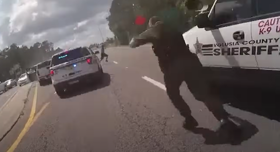 A fleeing armed suspect (left) engaged with a shootout with a Volusia County police officer (right). The suspect was eventually killed, while an officer was…