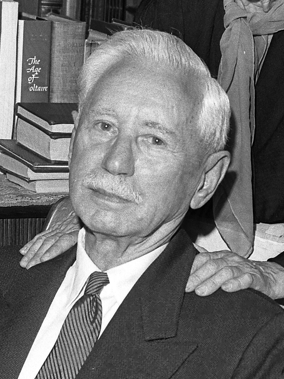 Authors Ariel and Will Durant in library of their home in Los Angeles