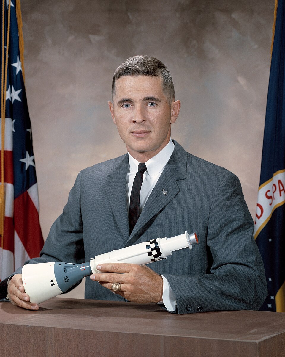 This is the official NASA portrait of astronaut William Anders. Anders was commissioned in the Air Force after graduation from the Naval Academy and served…
